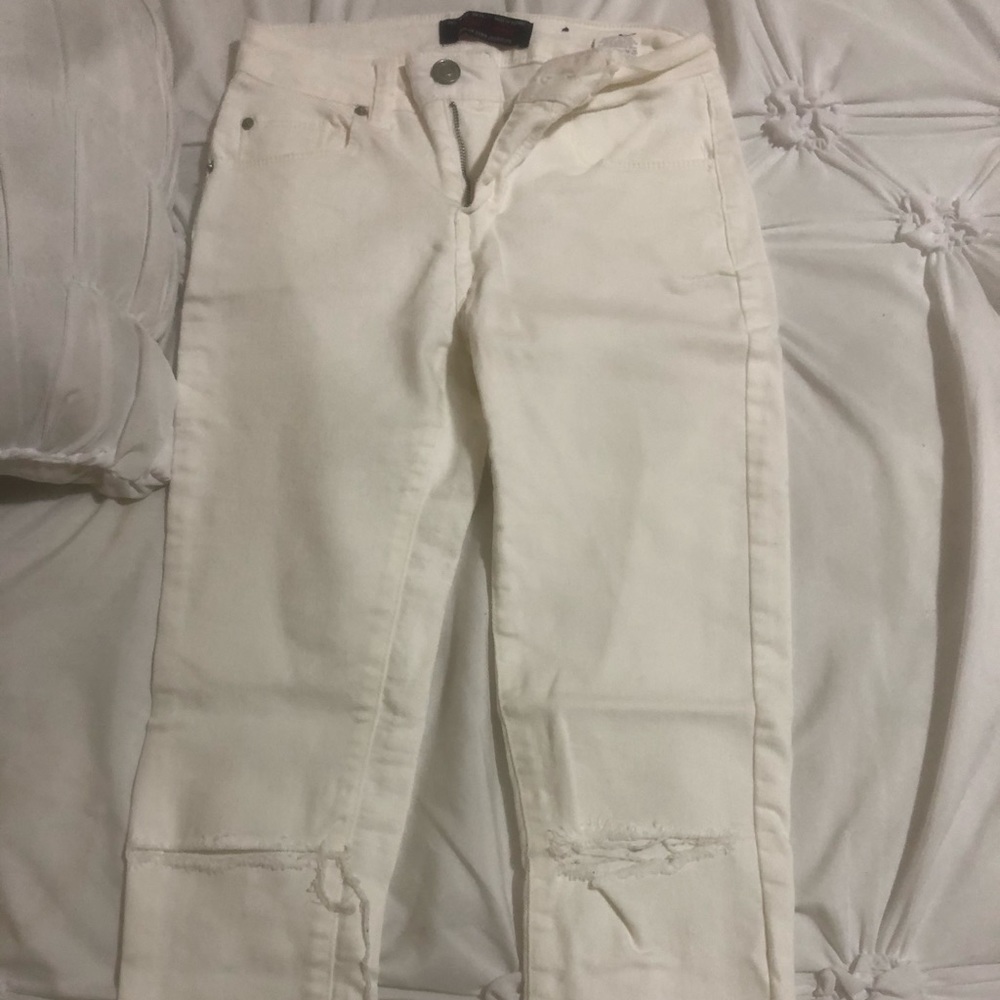 White ripped jeans